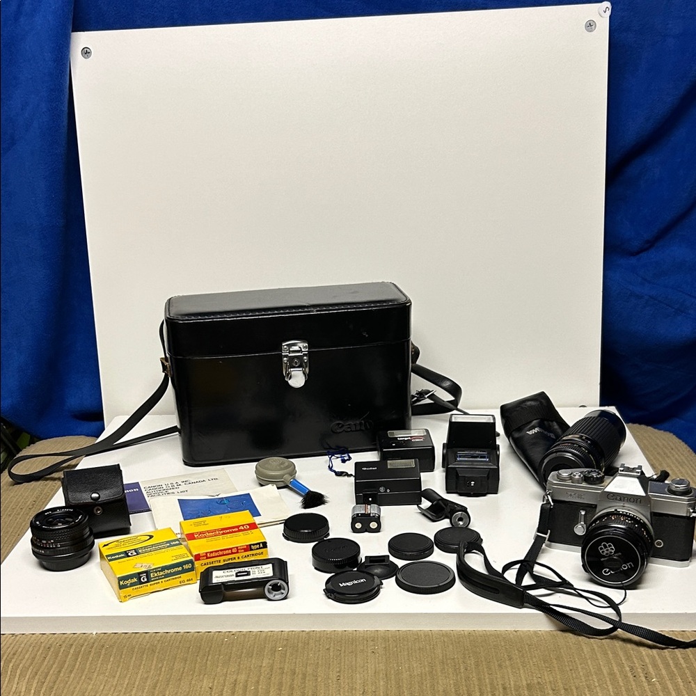 Vintage Canon TX camera with many parts untested